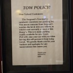 The horrifying "tow policy" sign in Denny's