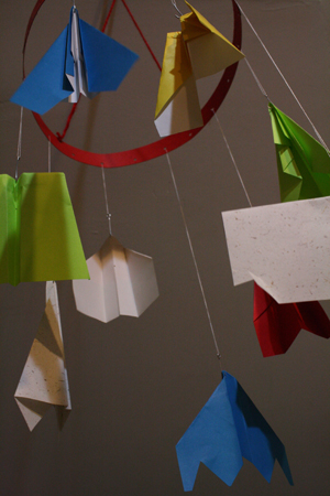 paper airplane mobile – decorative storage | Tally's Treasury